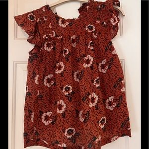 Flutter sleeve top! Perfect for work. Great with black or white denim.